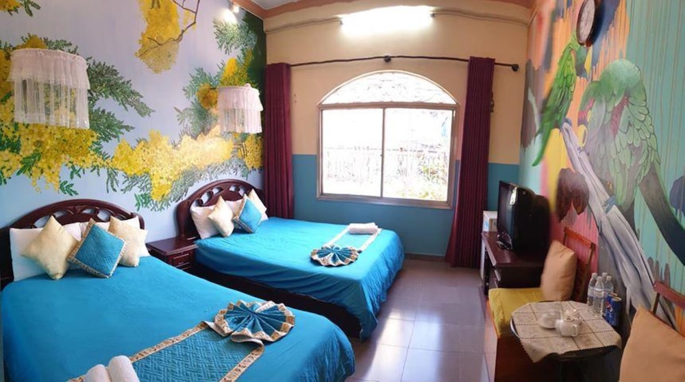 غرفة بسرير كوين بإطلالة على الحديقة، Memory Villa 4/9