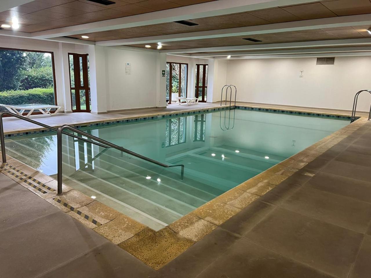 Hotel y Cabanas Punta Larga - Caja Los Andes 20/50