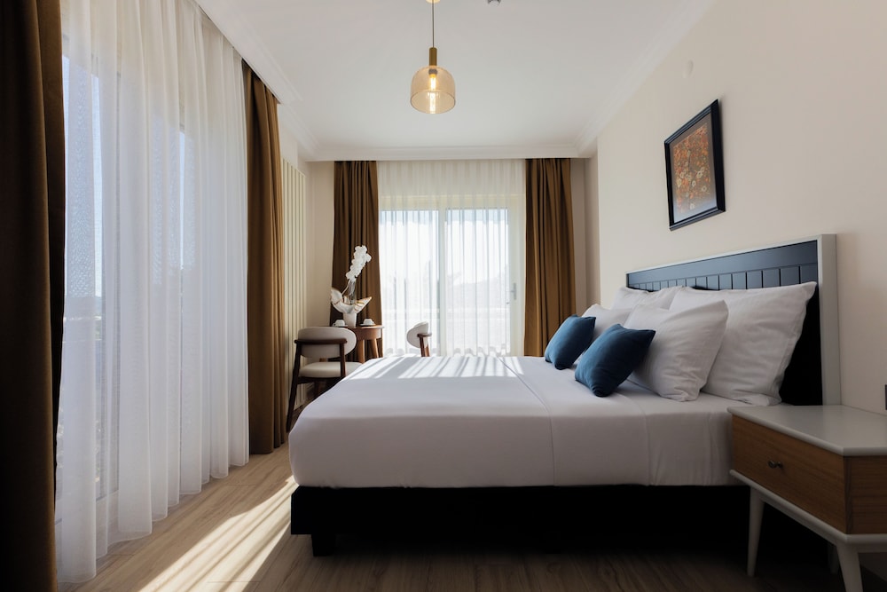 Kamer Suites And Hotel 13/50