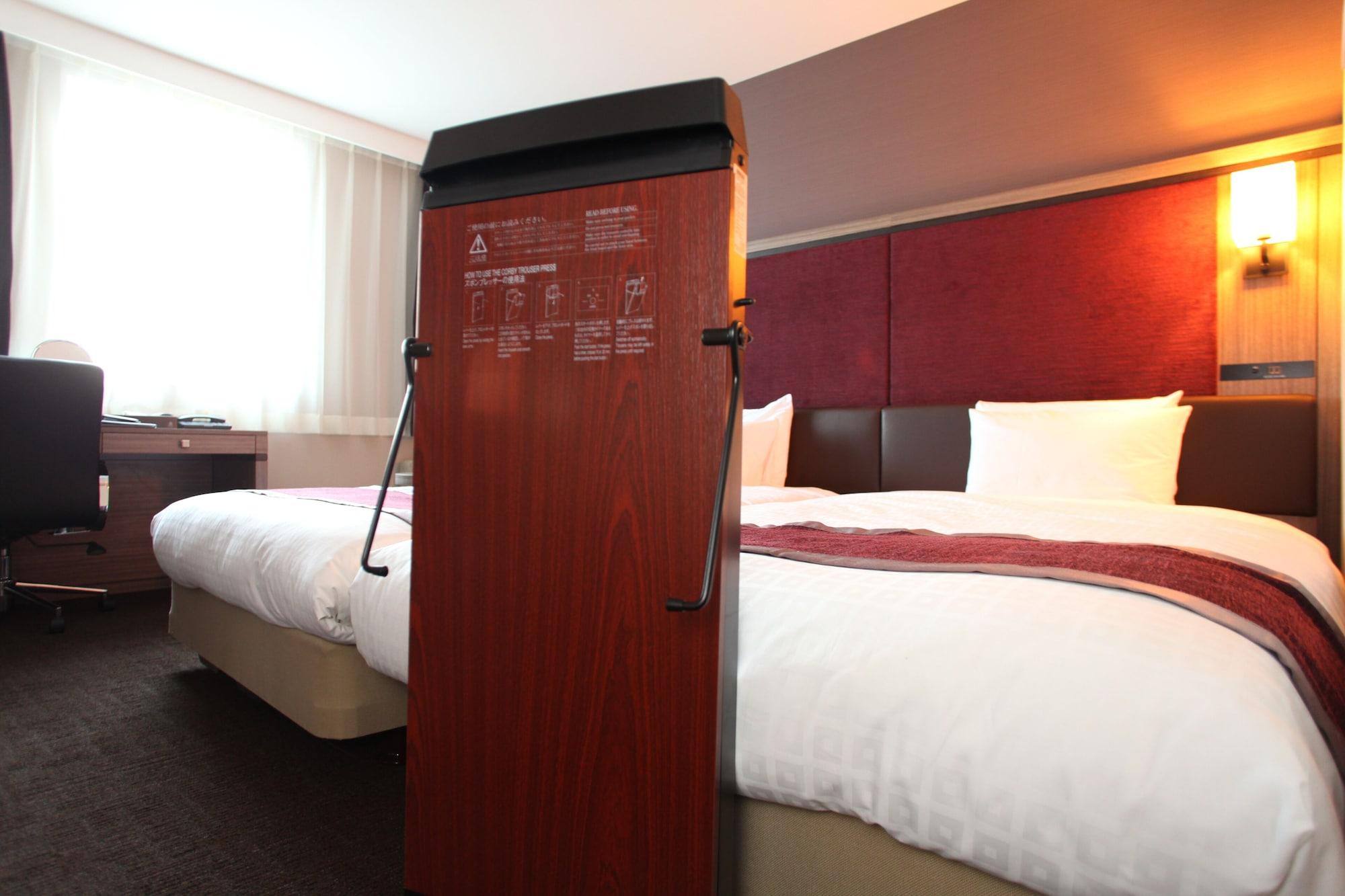 غرفة ثلاثية بسريرين منفصلين مع سرير إضافي، Daiwa Roynet Hotel Sapporo Susukino 3/4