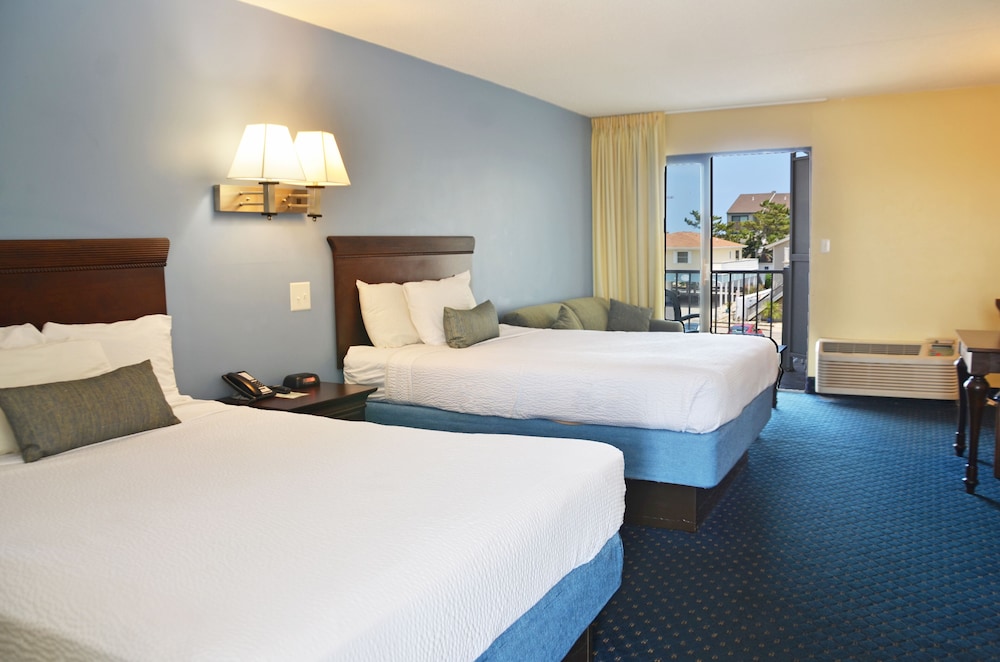 Coastal Palms Inn &amp; Suites 11/50