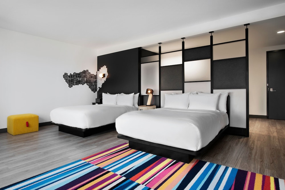 غرفة بسريرين كوين لذوي الإعاقة