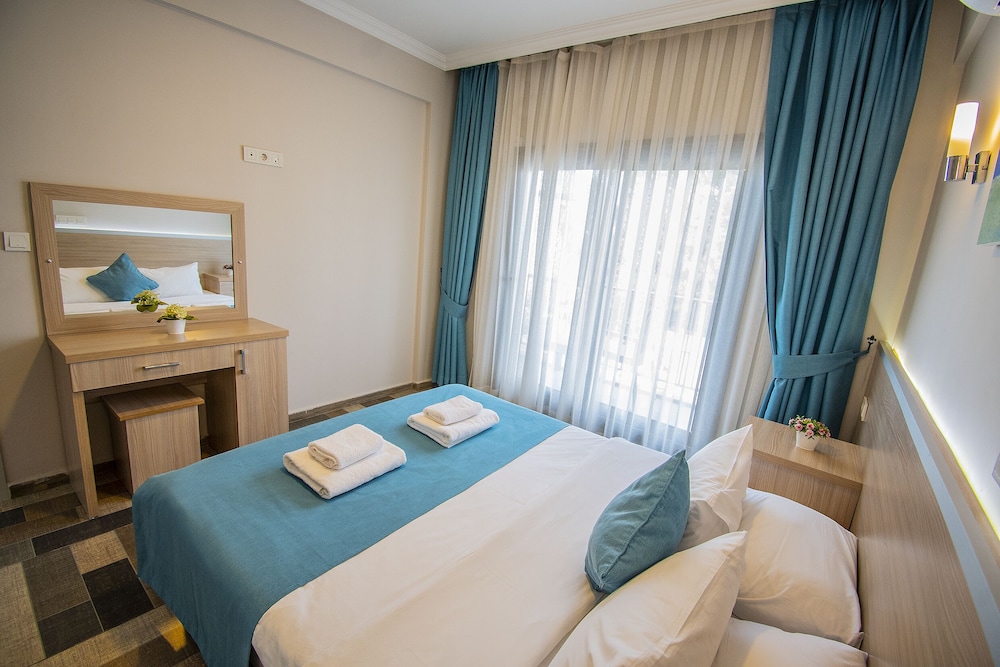 غرفة بسرير مزدوج بإطلالة على المدينة مع أريكة، M Suite Hotel 6/10