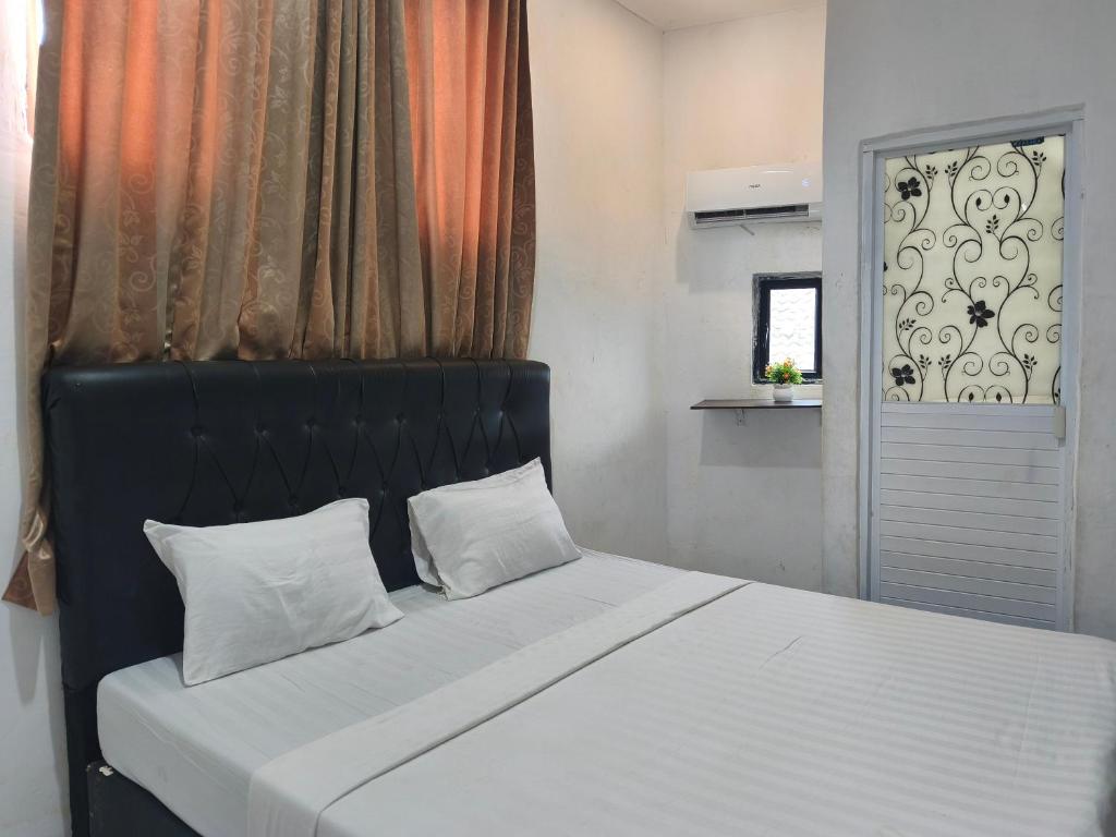 Room at Hotel O near Mall Boemi Kedaton formerly House Of Tuwuh 2, BANDAR LAMPUNG