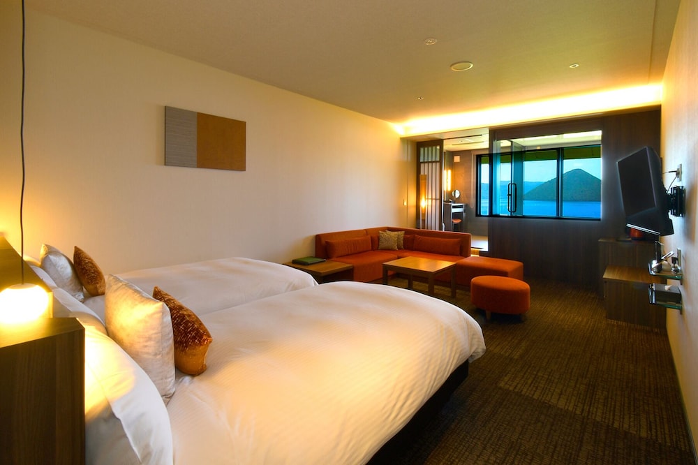 Exective Twin Room with Cypress Onsen View Bath Non Smoking، Hotel Premium Lake Toya 4/10