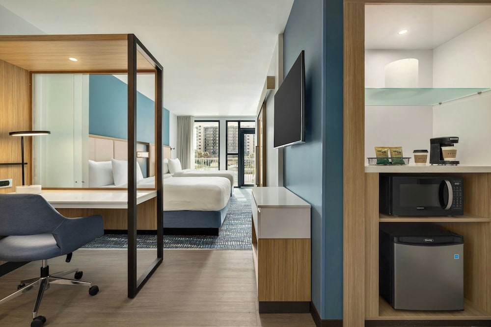 Suite, 2 Queen Beds, Side Pool View, Sofa, Balcony
