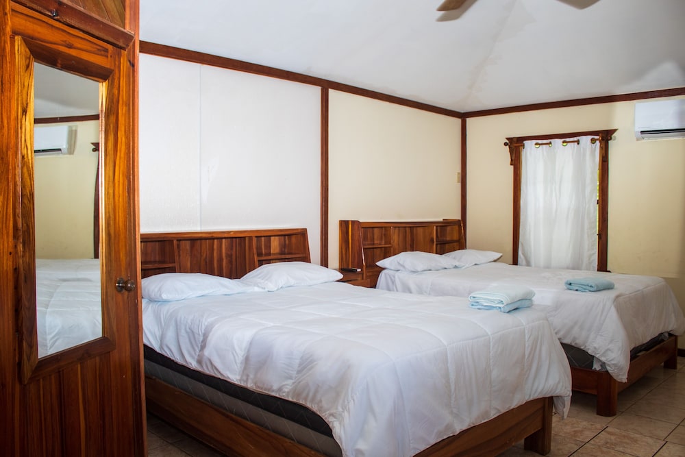 Room, 2 Queen Beds, Beach and Pool View