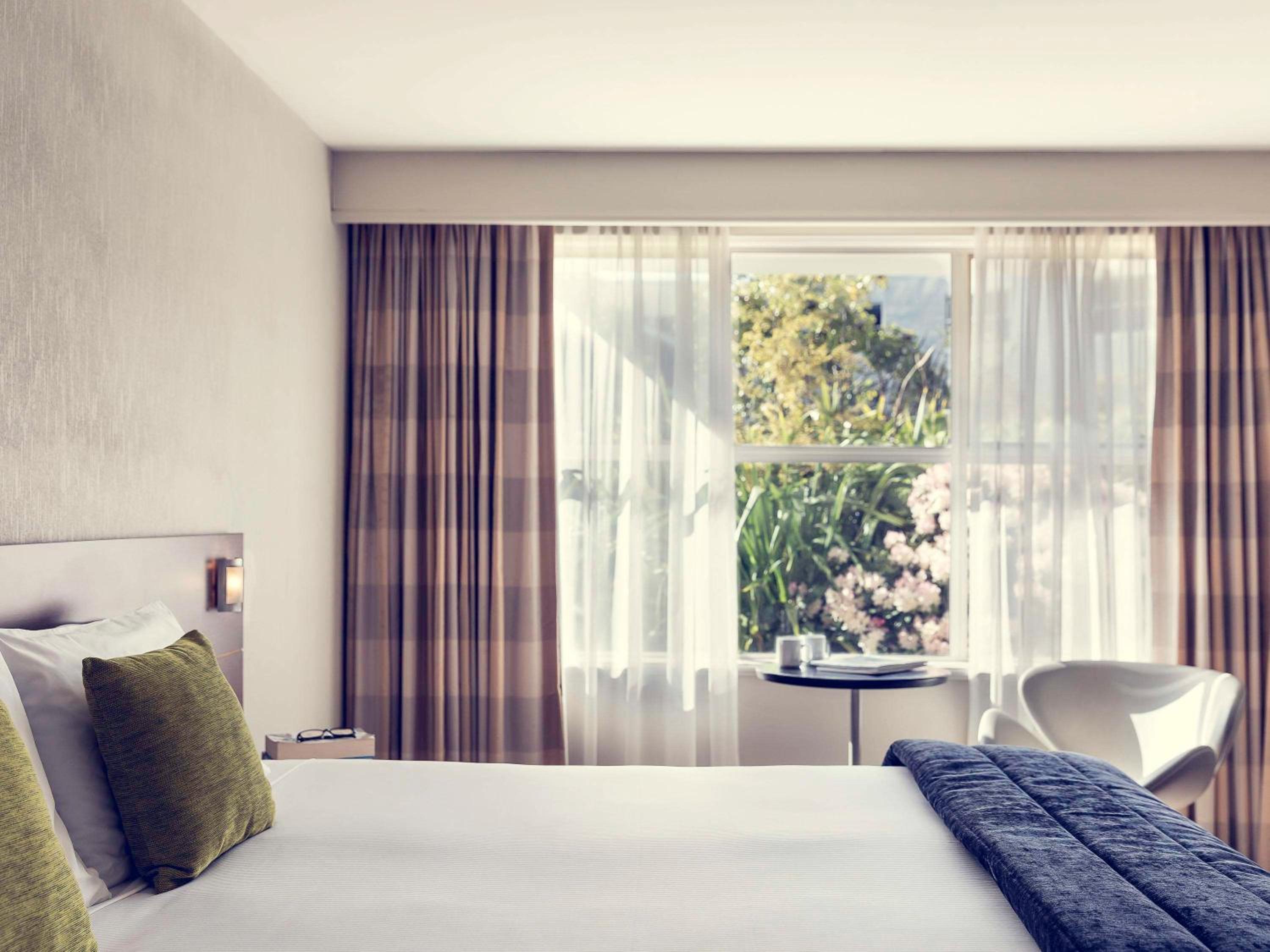 غرفة قياسية بسريرين مزدوجين بإطلالة على الحديقة، Movenpick Queenstown 2/4