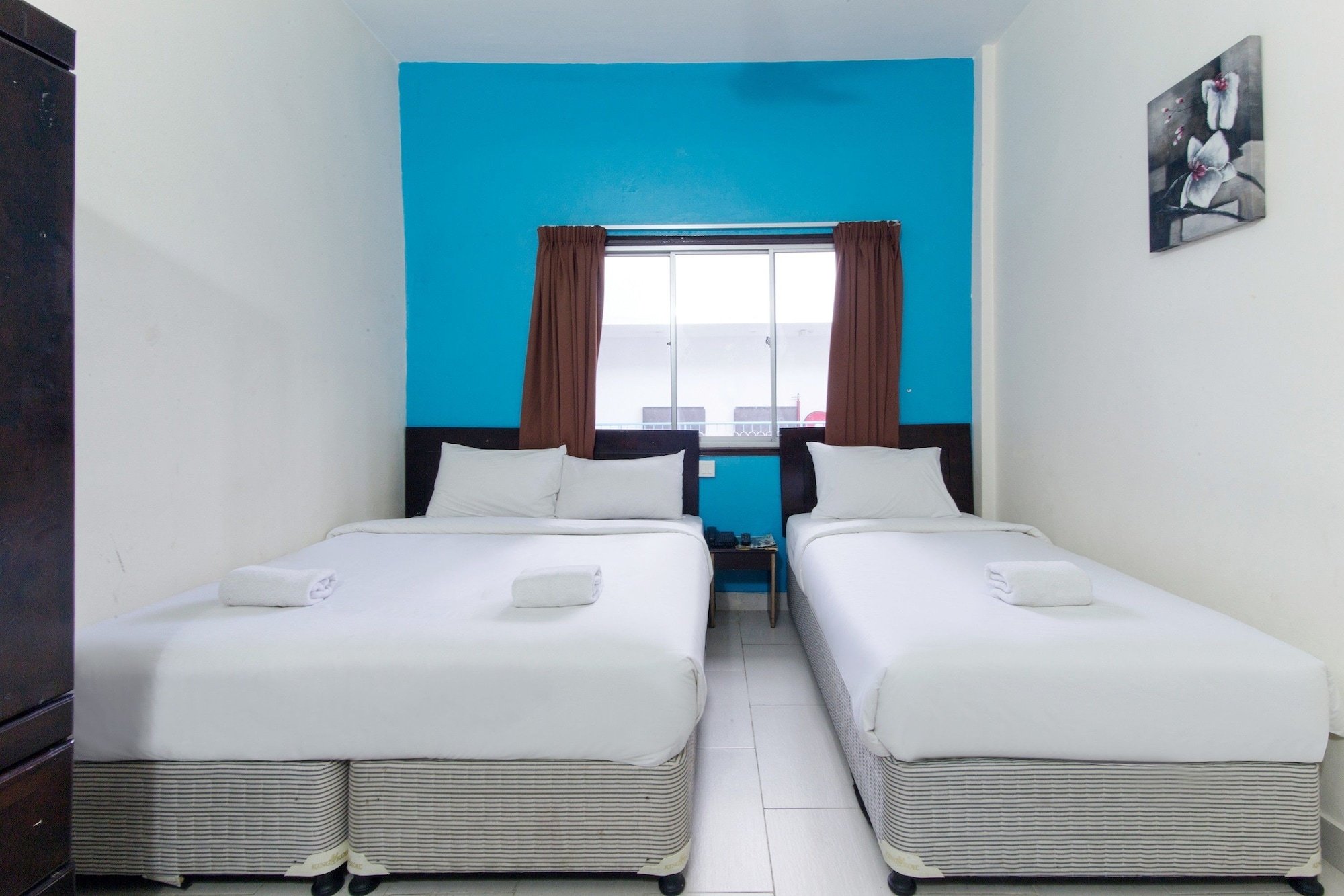 غرفة ثلاثية بسرير كوين وسرير فردي، Hotel Grand Mutiara 6/9