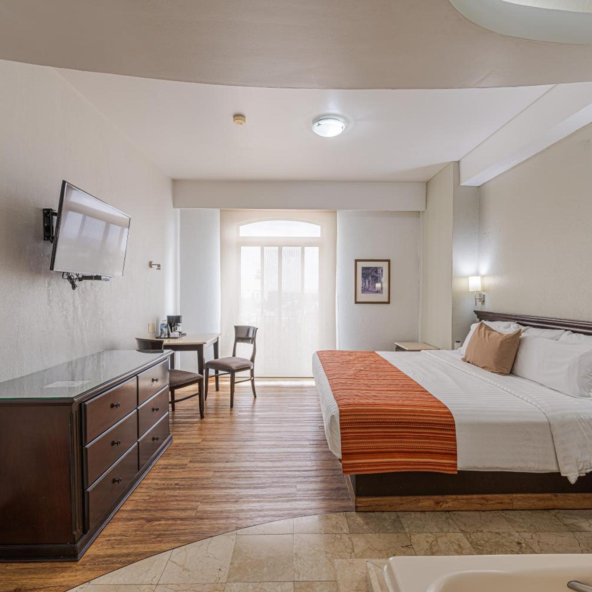 غرفة بسرير كوين بجاكوزي، HG HOTEL 4/10