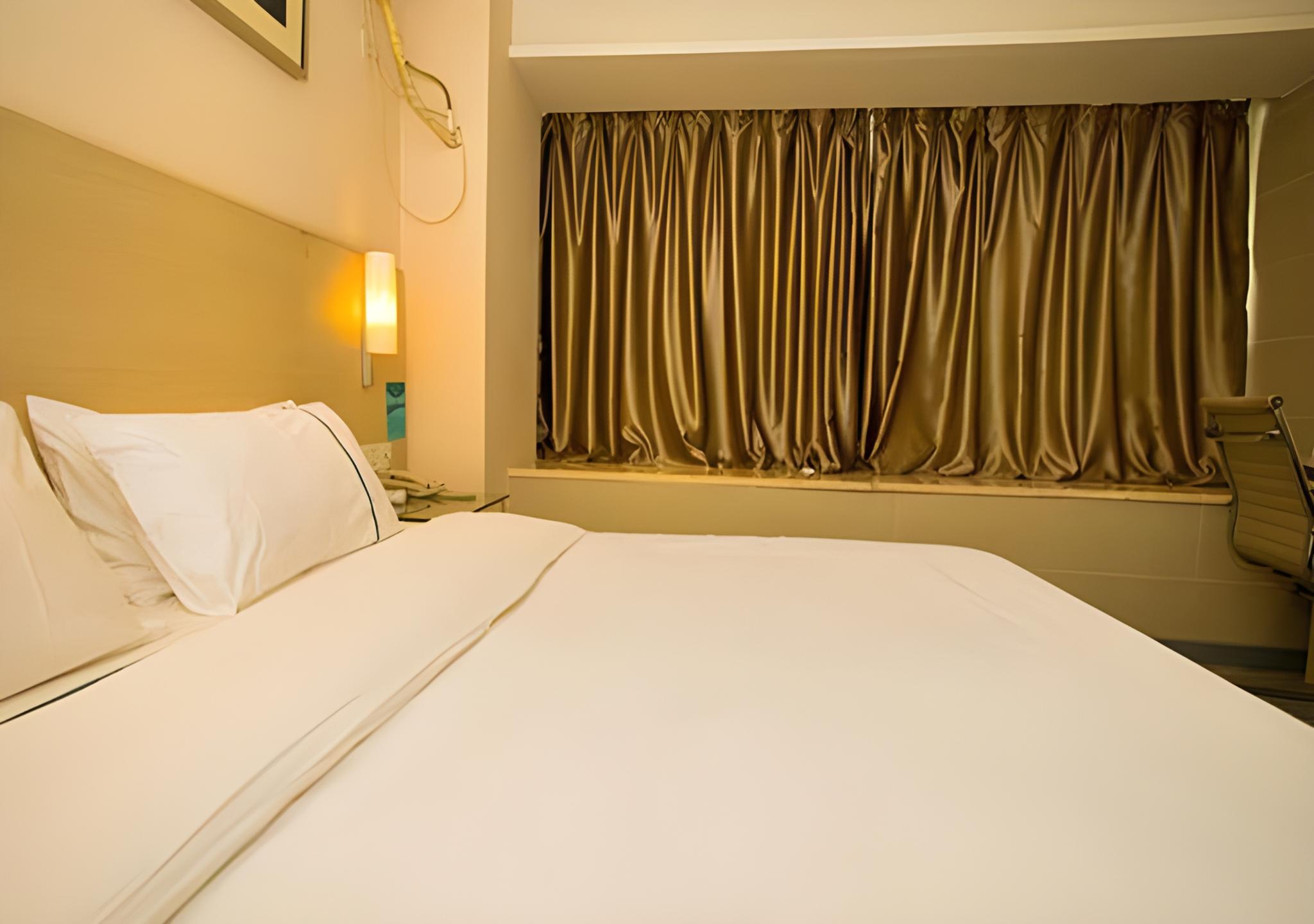 غرفة قياسية بسرير كوين، City Comfort Inn Wuhan Jiangxia 3/3
