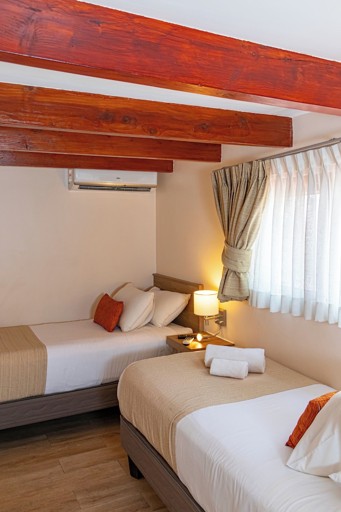 Tagle Hotel Boutique 15/64