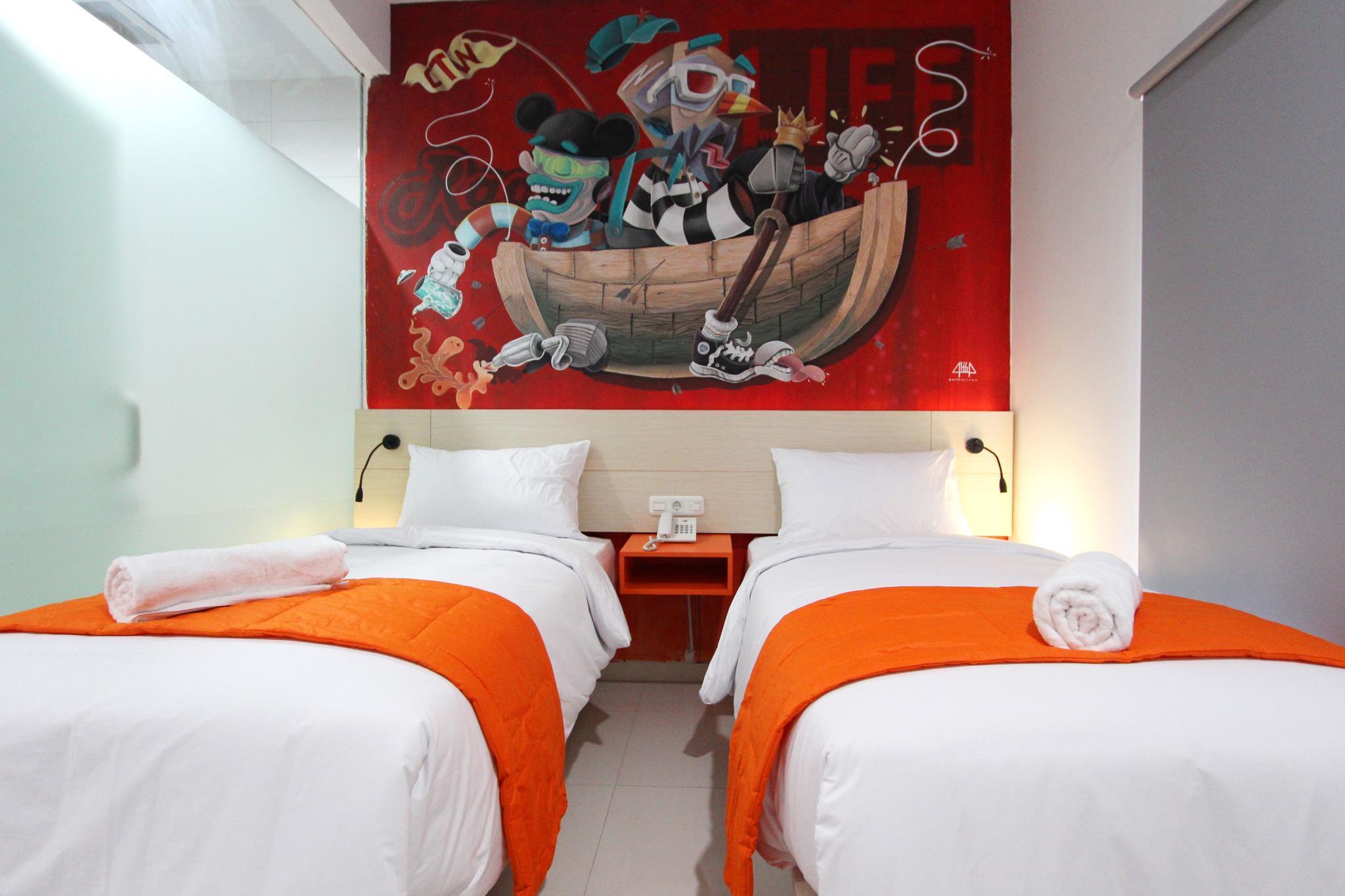 غرفة جونيور بأربعة أسرّة وسريرين منفصلين، FIZZ HOTEL LOMBOK 2/2