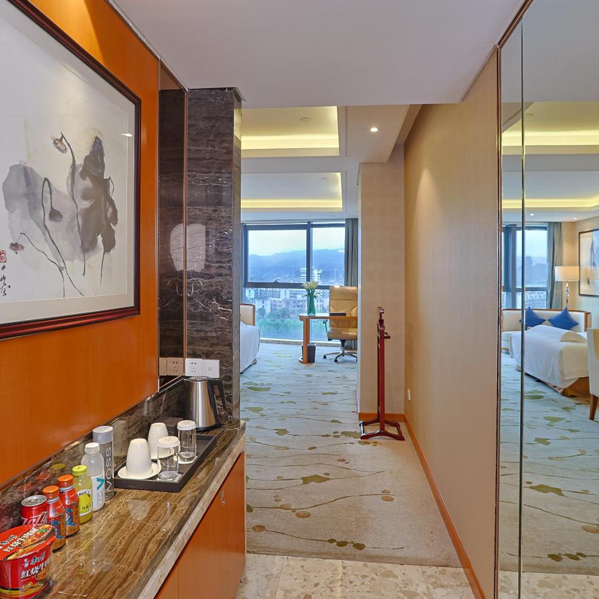 غرفة ديلوكس بسرير كينج وسرير كوين بإطلالة على النهر، Yiwu Shangcheng Hotel 5/8
