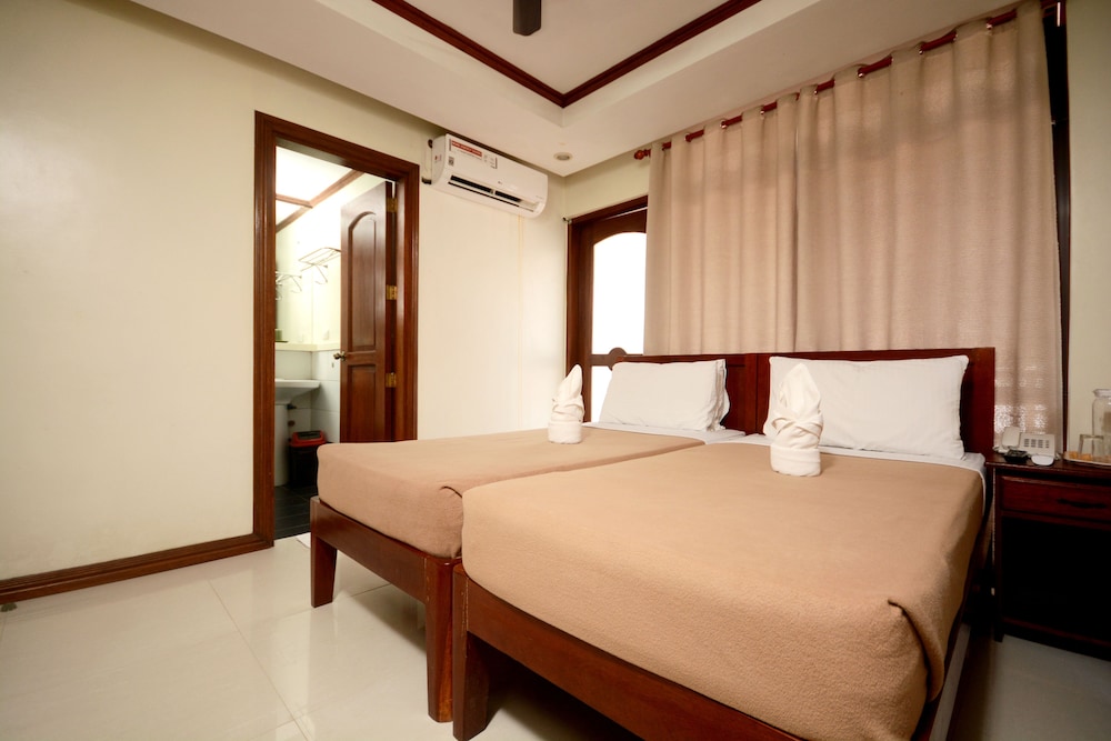 غرفة سوبيريور بسريرين منفصلين، Ipil Suites El Nido 2/5