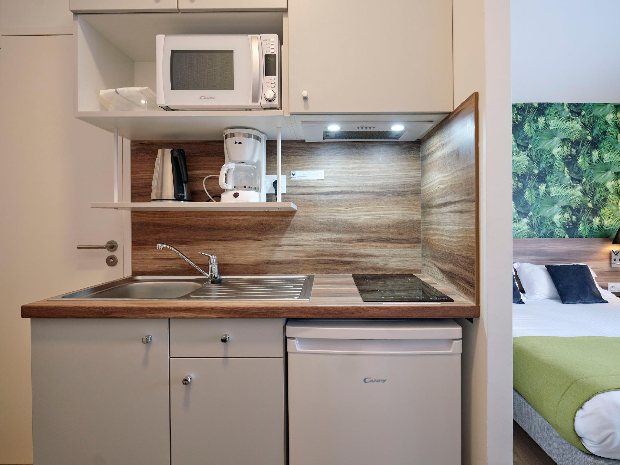ATHOME RESIDENCE ET SPA 39/40