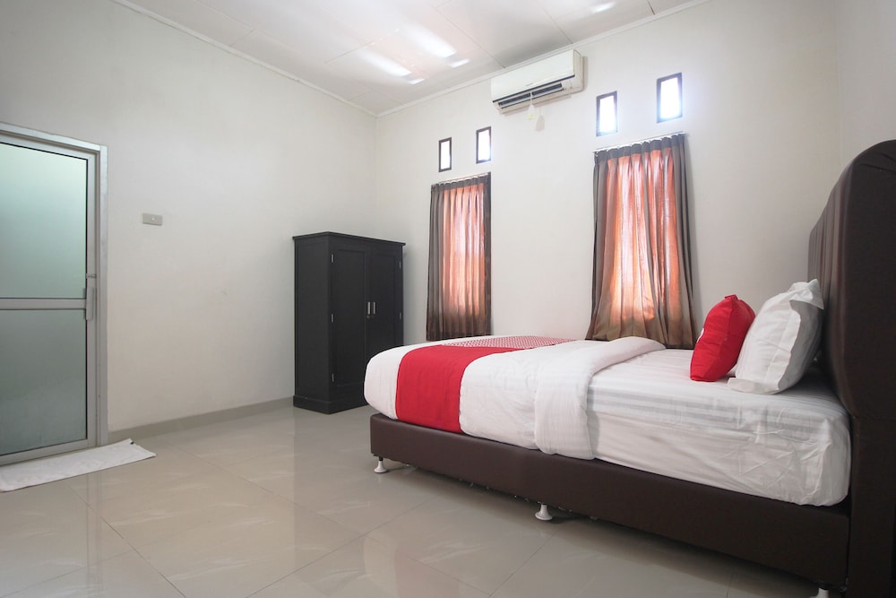 OYO 1547 Wisma Ray Syariah 9/31