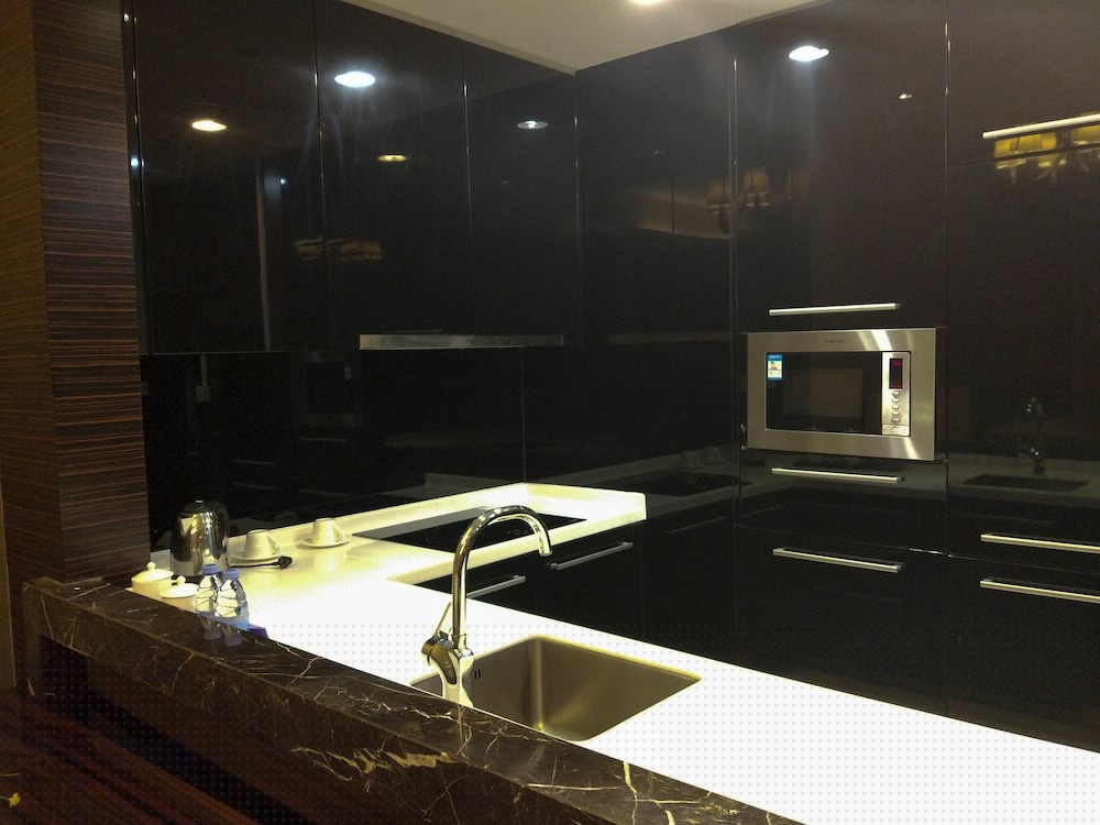 Xingyi International Hotel Poly Store 34/70