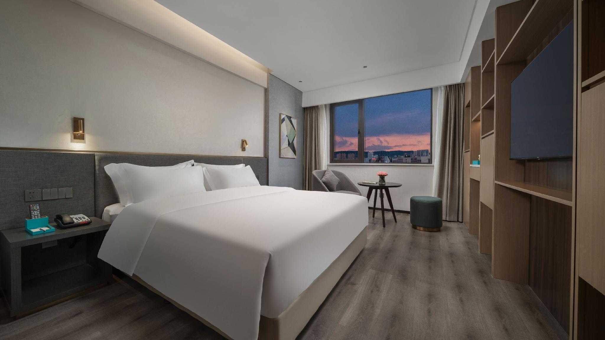 Kaiyuan Yiju Hotel (Xinchang Dafosi store) 18/47