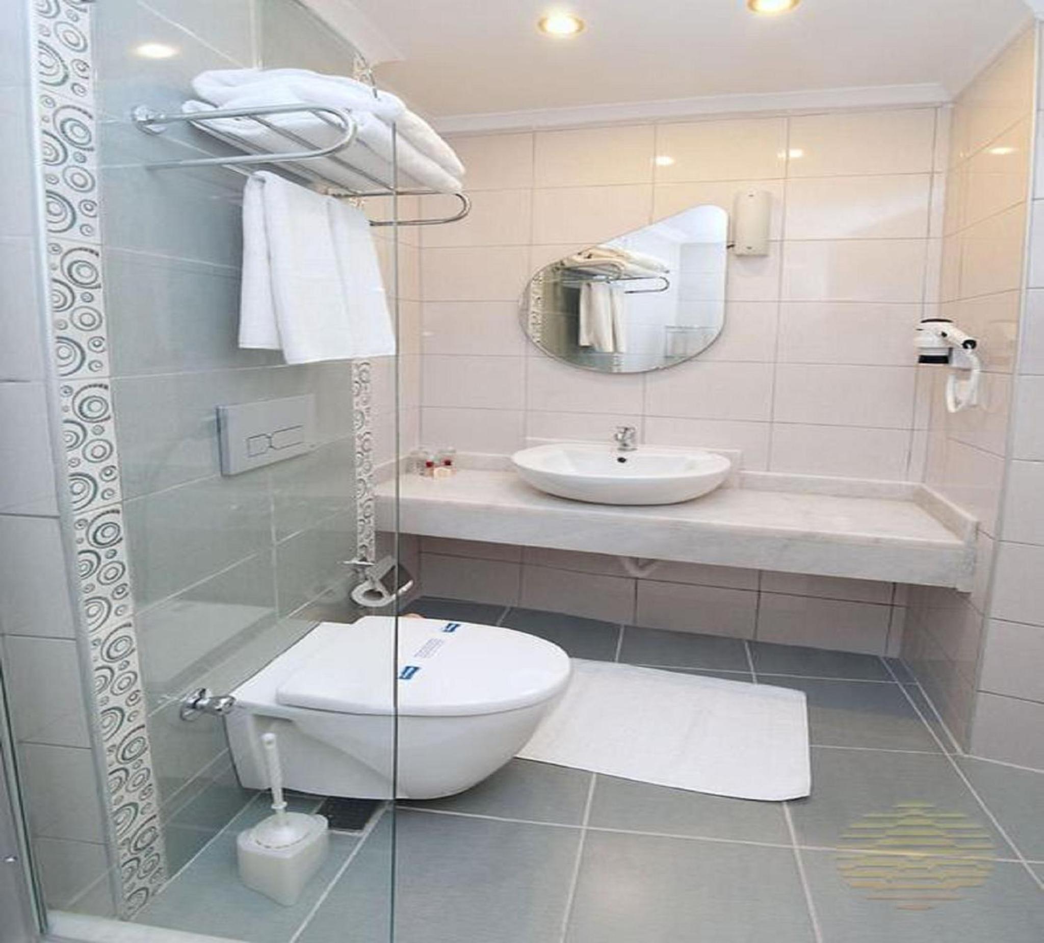 غرفة قياسية ثلاثية بسرير مزدوج وسرير فردي، Azak Hotel 2/3