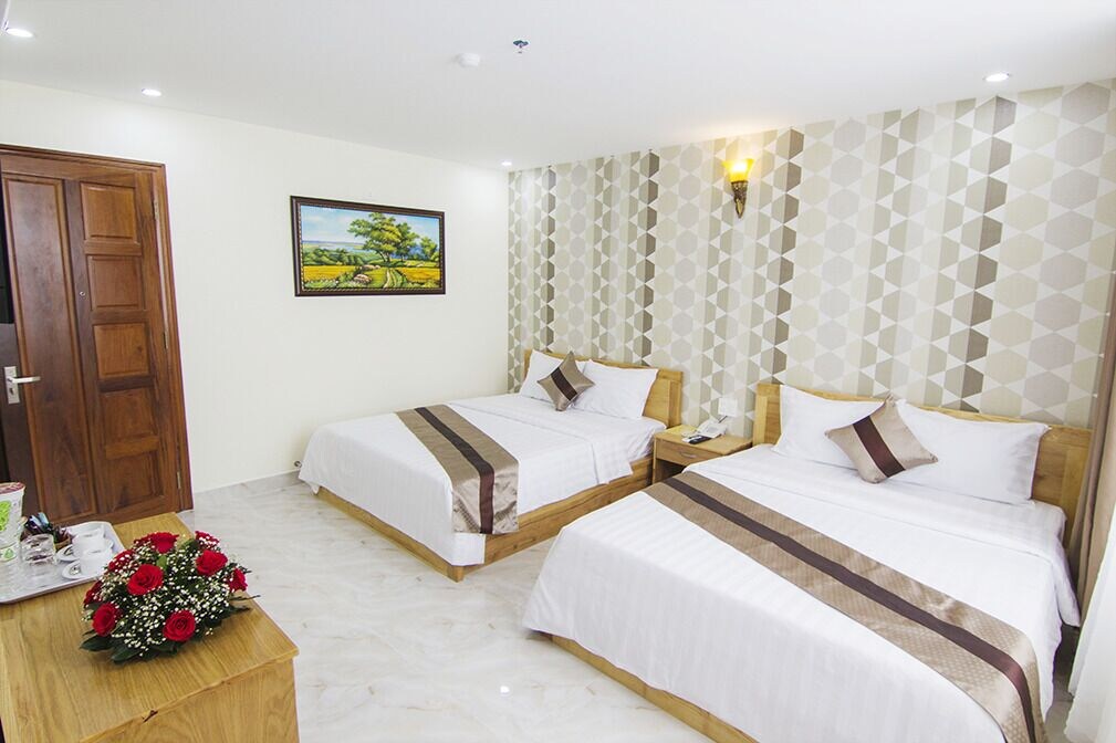غرفة ديلوكس رباعية بإطلالة على المدينة، Ngoc Hanh Beach Hotel 3/10