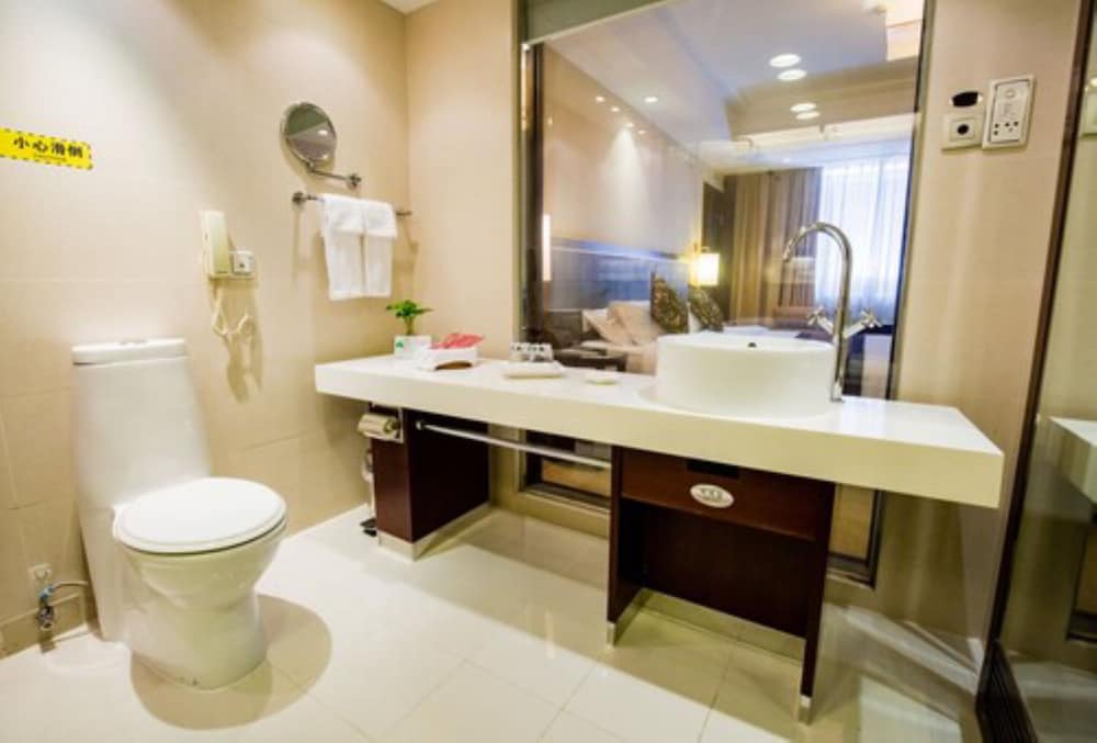 GUANGZHOU NEW CENTURY HOTEL 60/65