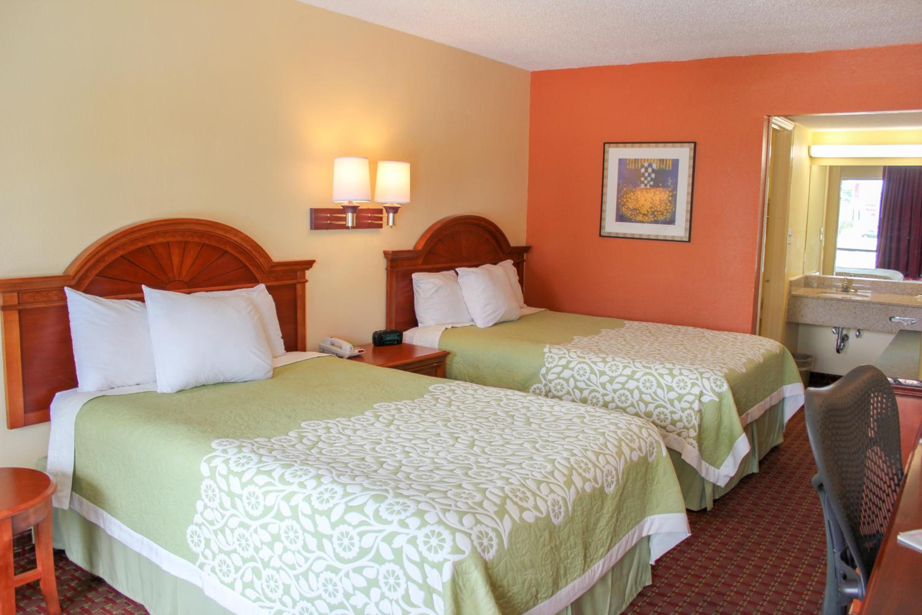 Rose Garden Inn & Suites 12/25