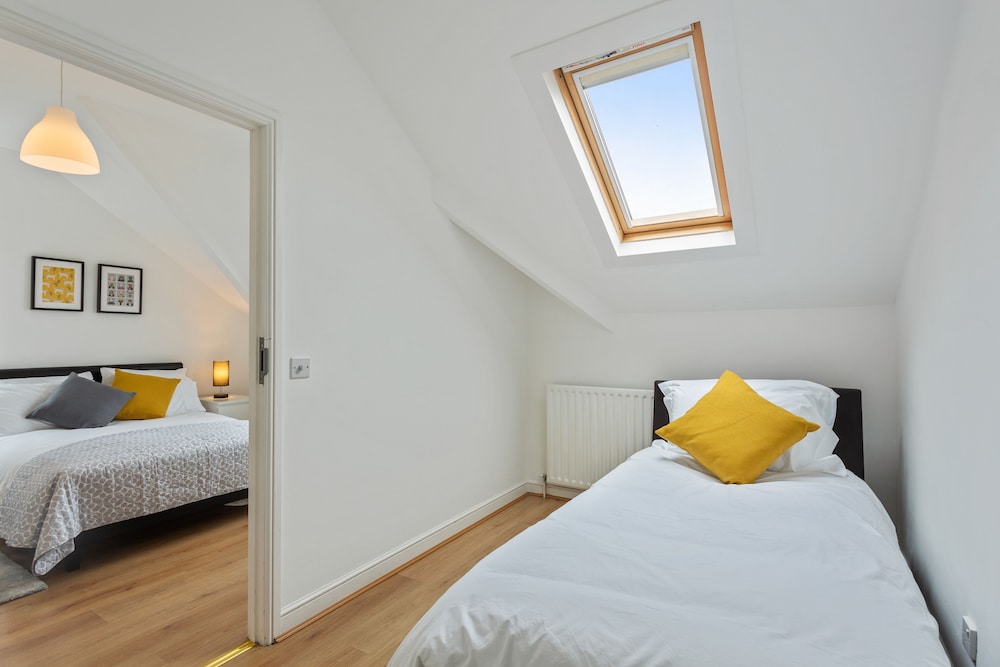 Adjoining, Deluxe, Triple, 1 King and 1 Single Beds