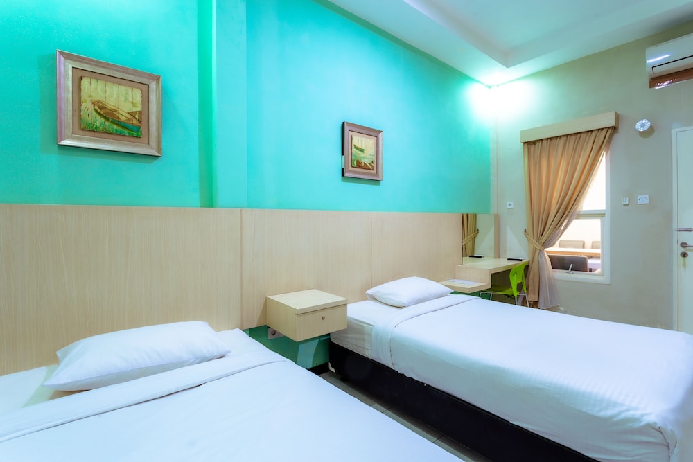 Ardhya Guest House 13/46