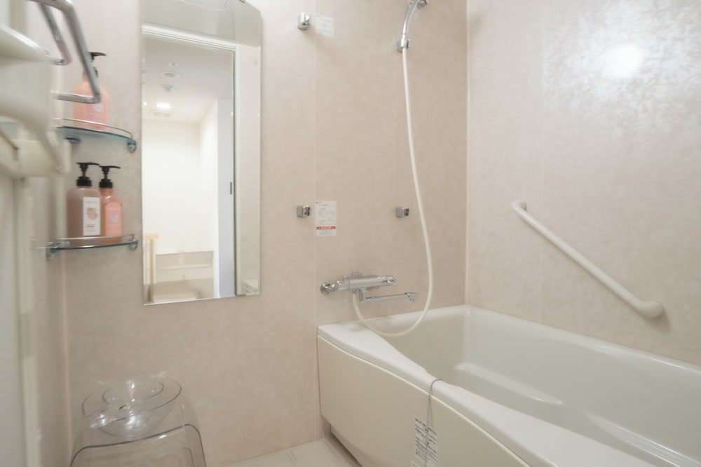 غرفة عائلية بسريرين منفصلين وسرير كينج، KANKU JOYTEL HOTEL 5/6