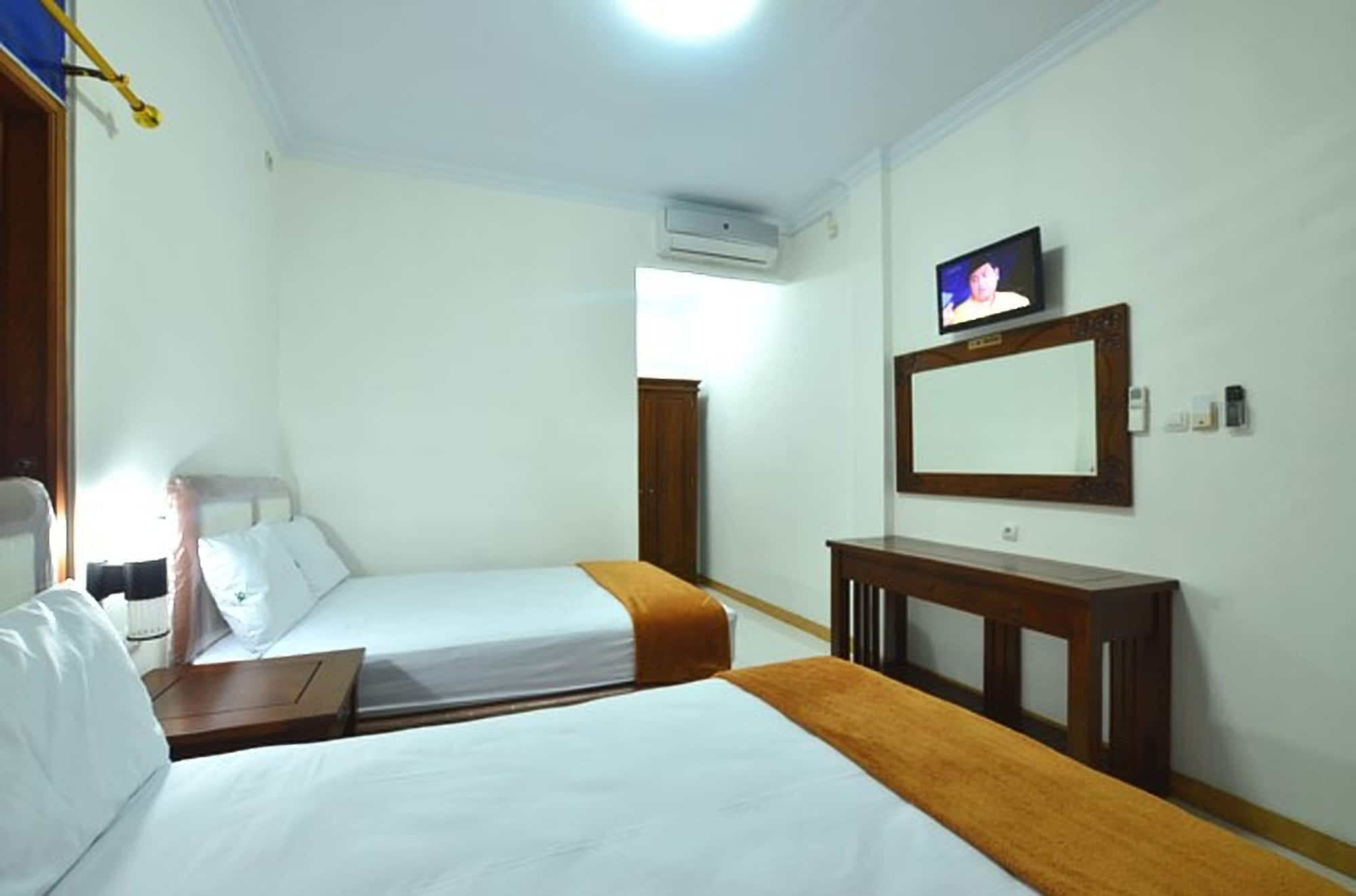 DELUXE, STUDIO, 2 DOUBLE BEDS