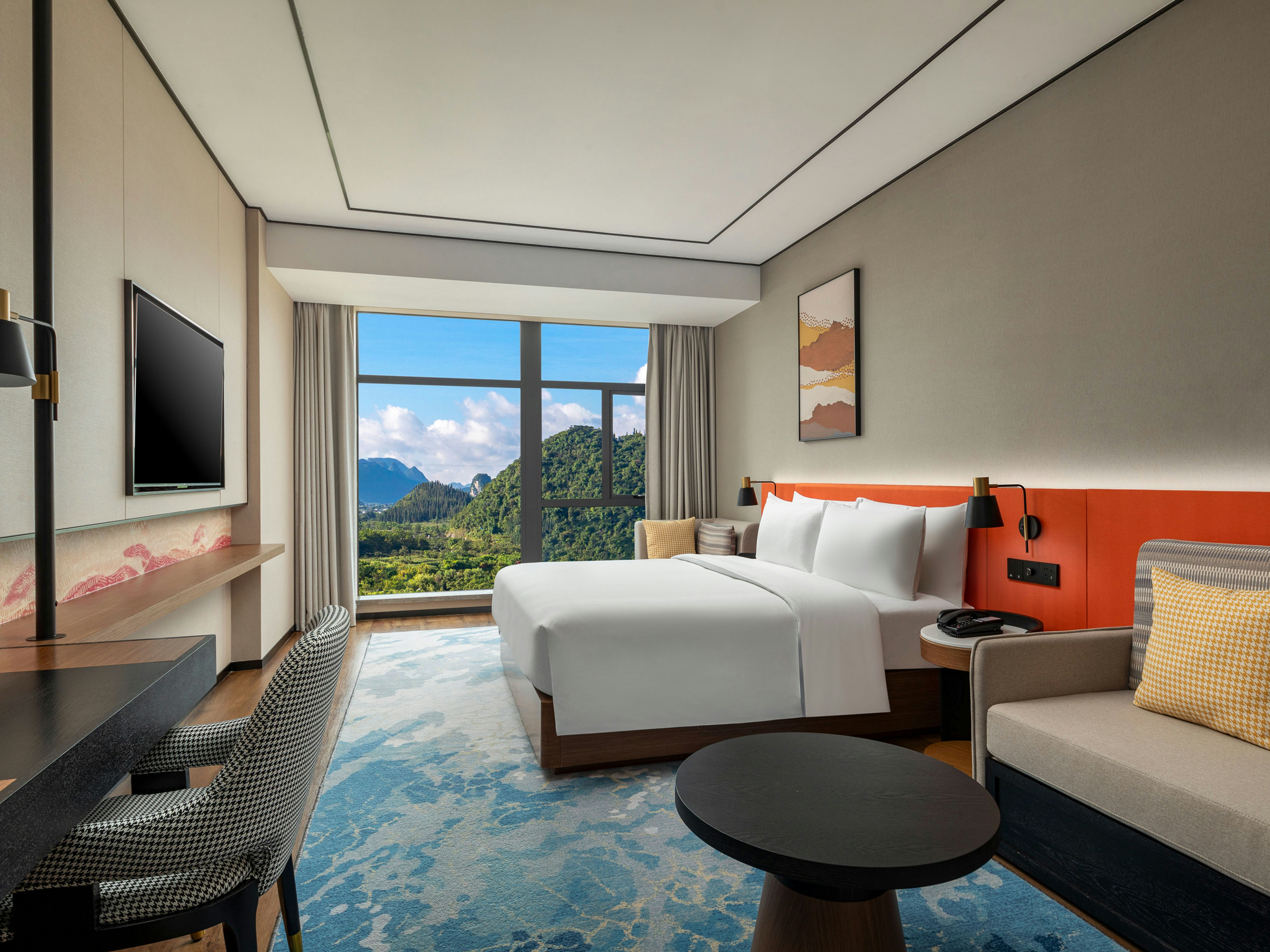 غرفة ديلوكس بسرير كينج، Hilton Garden Inn Xingyi Wanfenglin 2/2