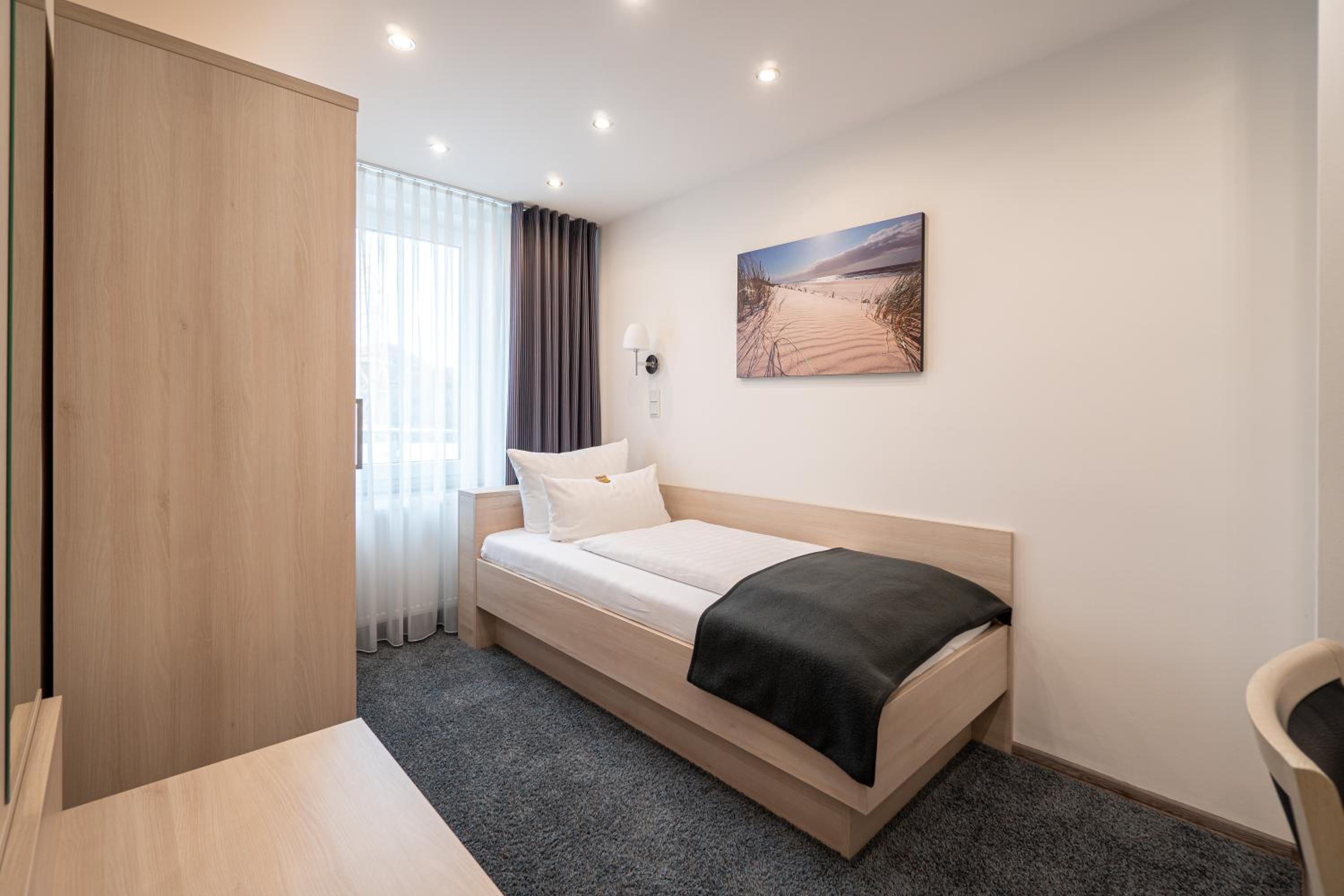 غرفة سوبيريور ثلاثية بسرير فردي، Hotel Deutscher Hof 3/5