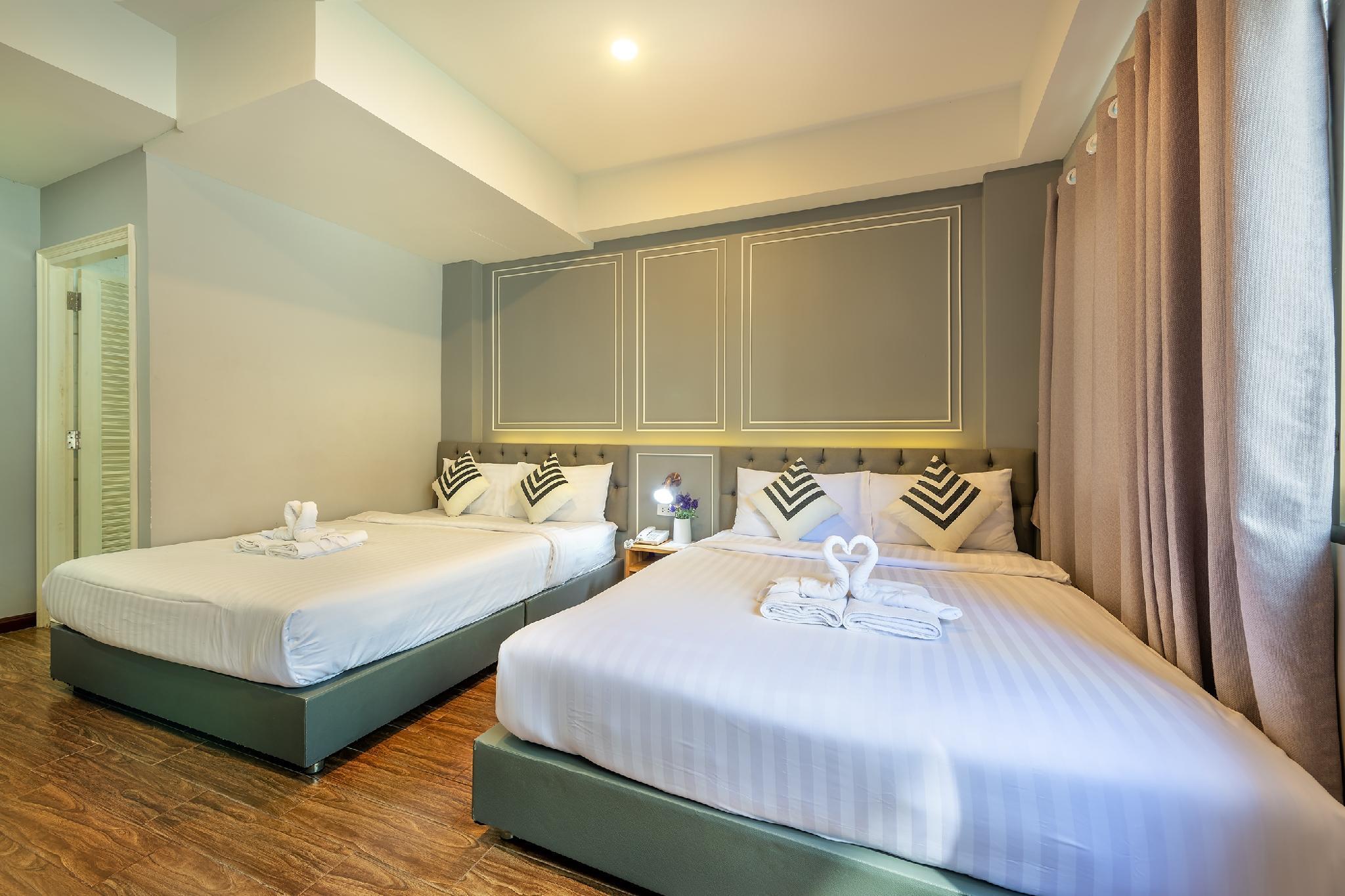 غرفة عائلية بسريرين مزدوجين