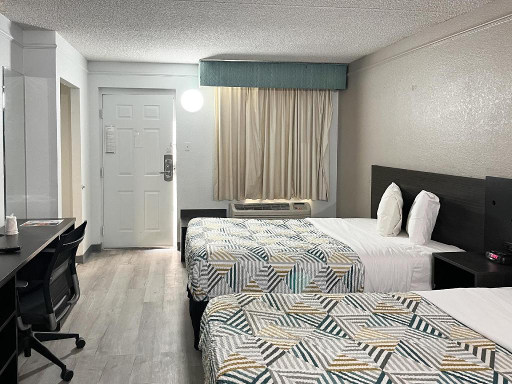 2 Full Beds - Mobil Access Tub Nsmk Kitchen، Studio6 Lafayette, LA - I-10 & I-49 N 4/8