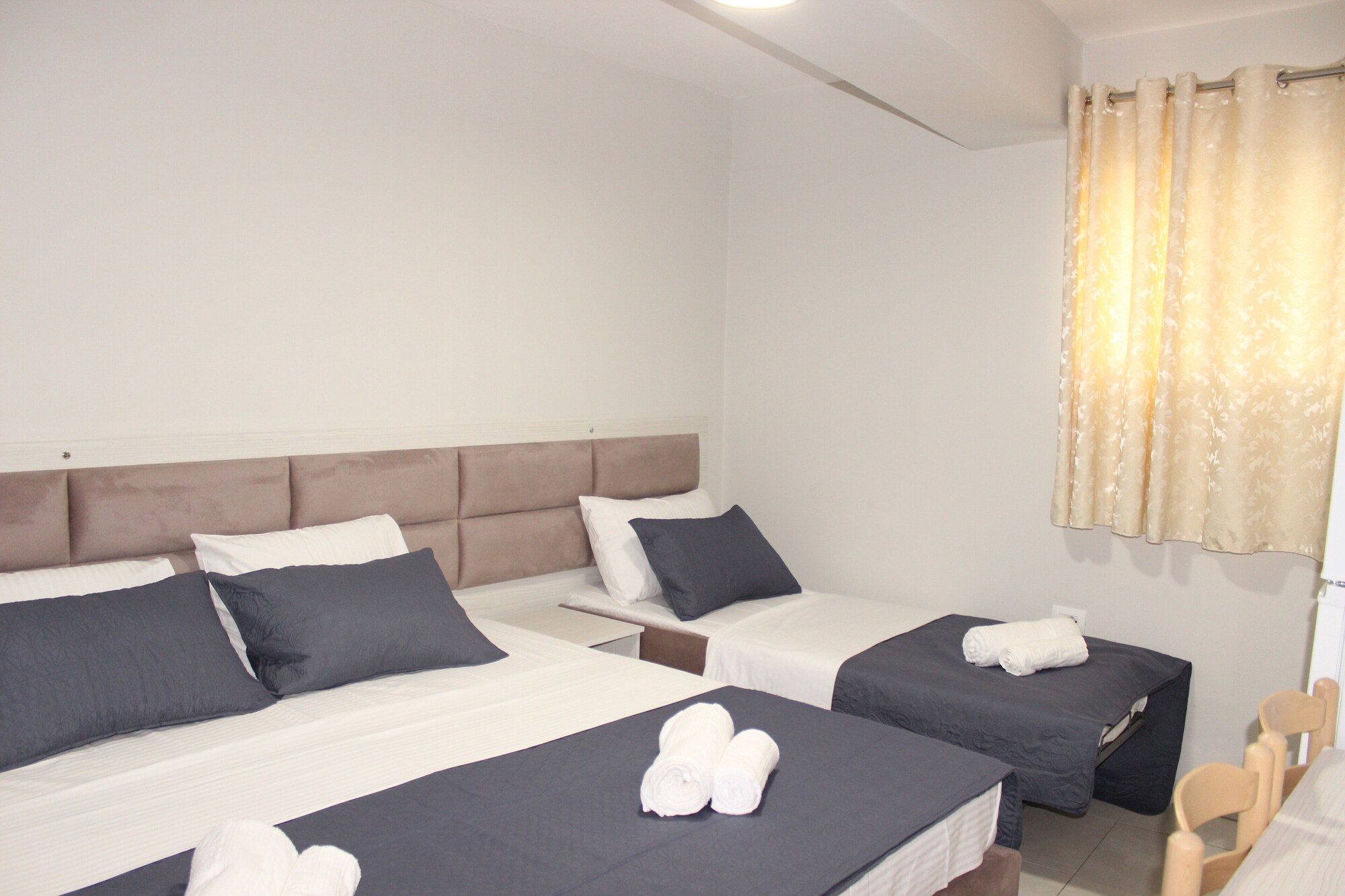 Economy, Triple, 1 Double and 1 Single Bed
