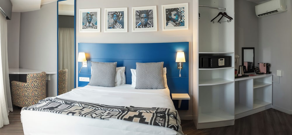 غرفة تنفيذية بسرير كوين، Onomo Johannesburg Sandton Hotel 8/10