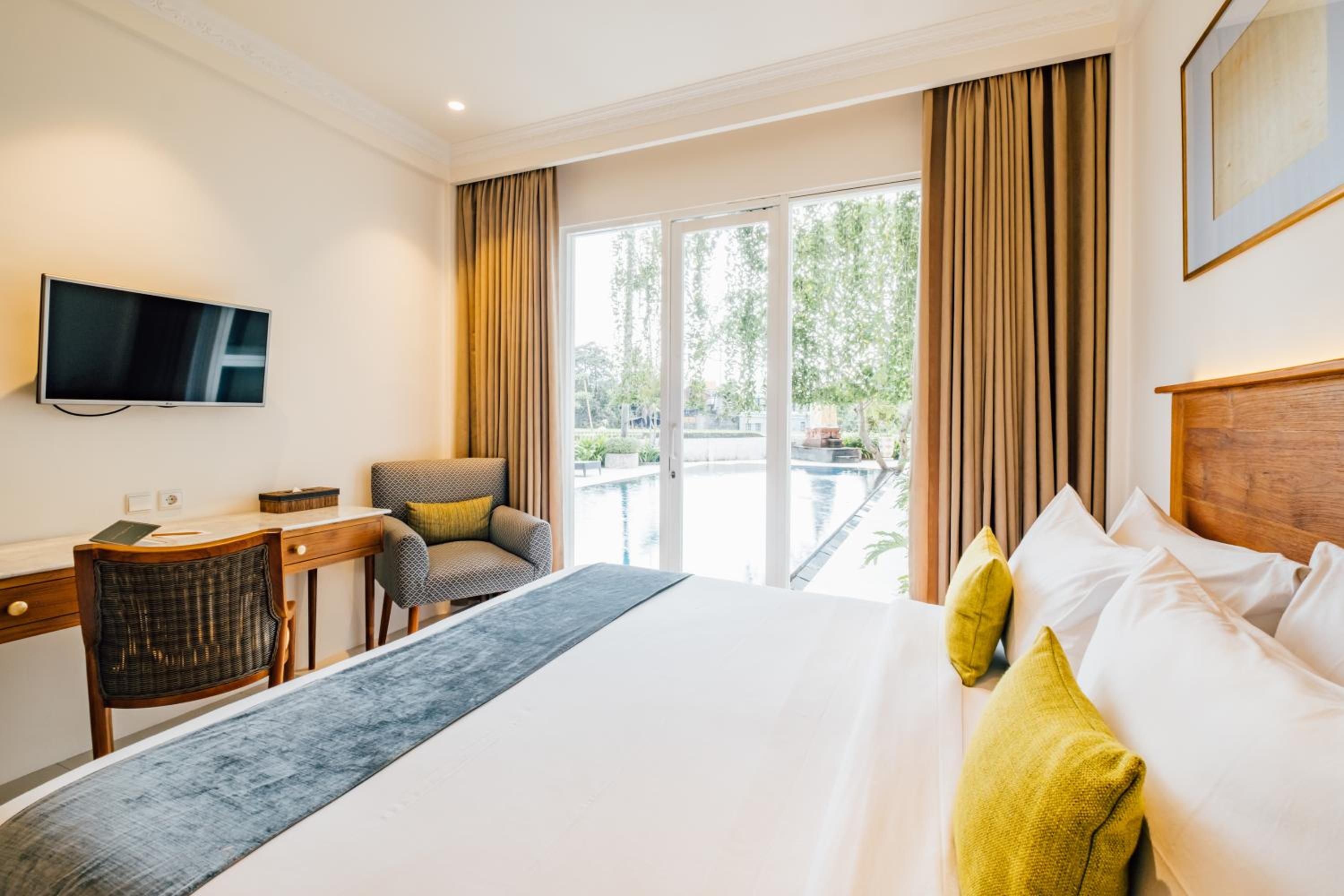 غرفة سوبيريور بسرير مزدوج أو سريرين منفصلين بإطلالة على المسبح، Umpadhi Canggu Hotel 2/7