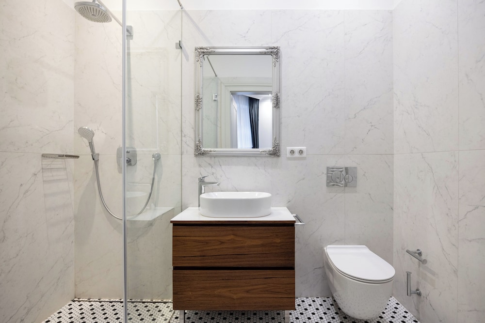 شقة ديلوكس بسريرين كينج بـ3 غرف نوم، Utto Luxury Suites 4/8