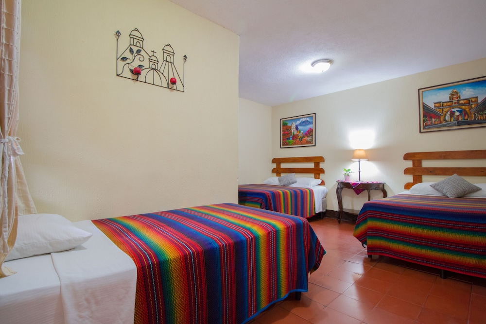 Standard, Triple, 1 Single and 2 Double Beds, Courtyard View