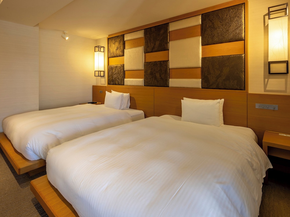 DELUXE, TWIN BEDS, OUTDOOR BATH