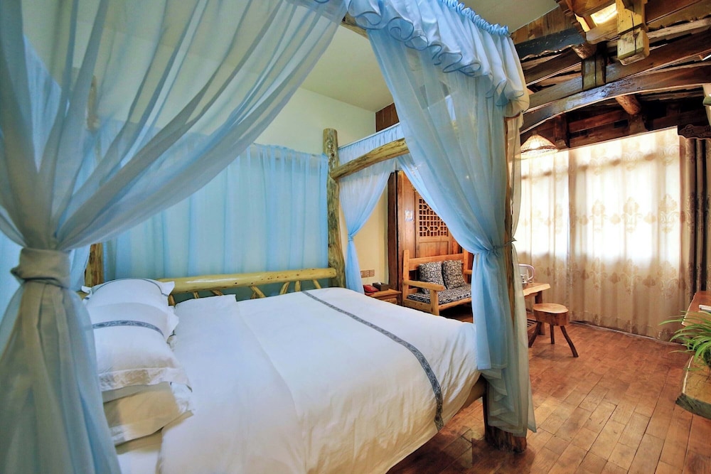 غرفة رومانسية بسرير كوين بإطلالة على الجبل، Xiangxi Dreamweaver Inn 4/6