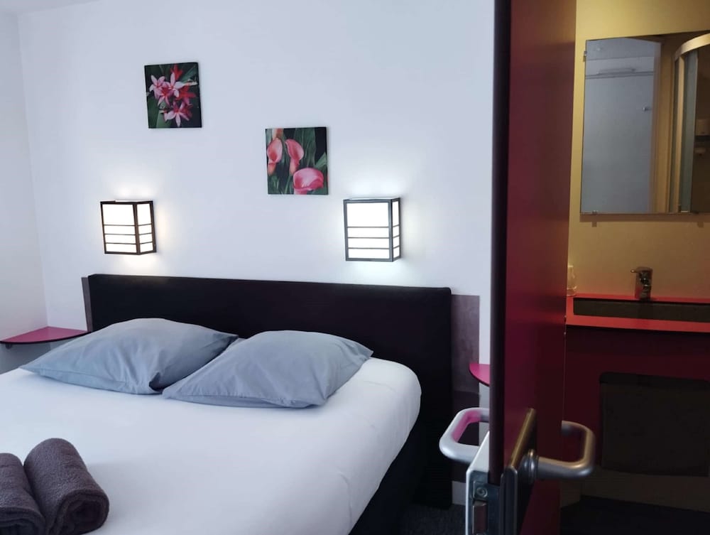 غرفة قياسية بسرير فردي، Kyriad Direct Saintes 3/9