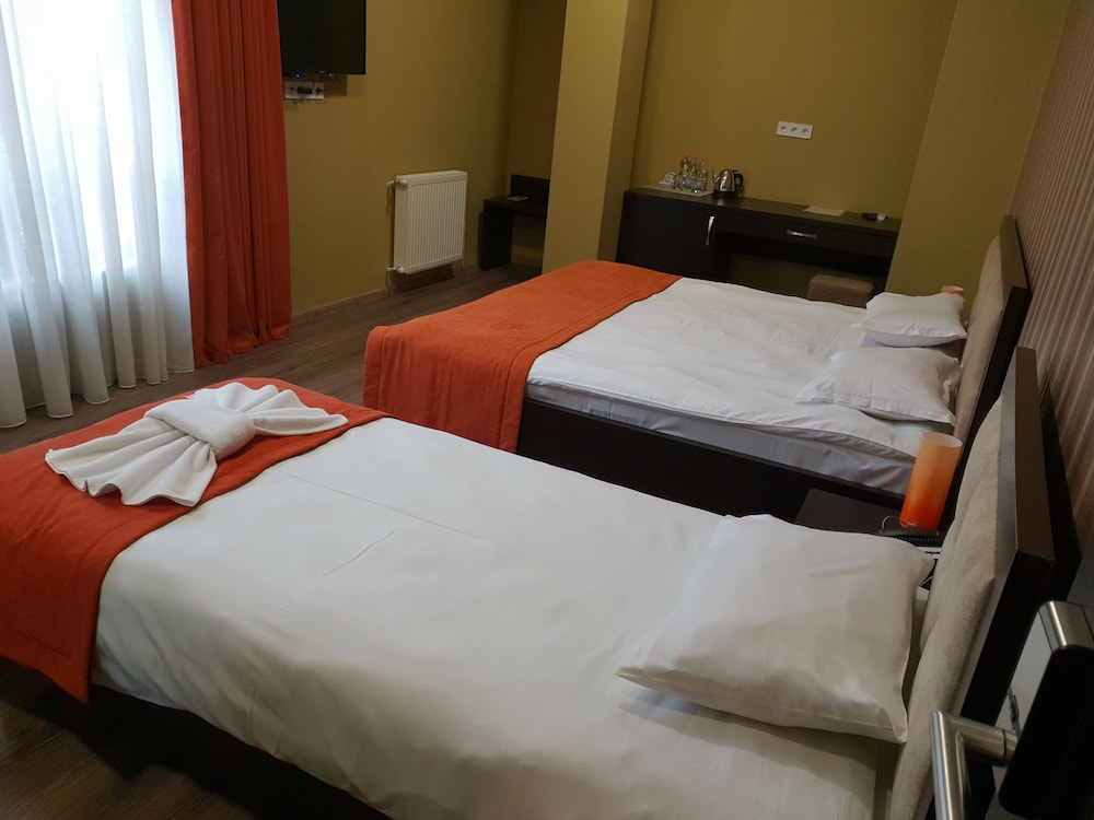 STANDARD, TRIPLE, 1 DOUBLE AND 1 SINGLE BED