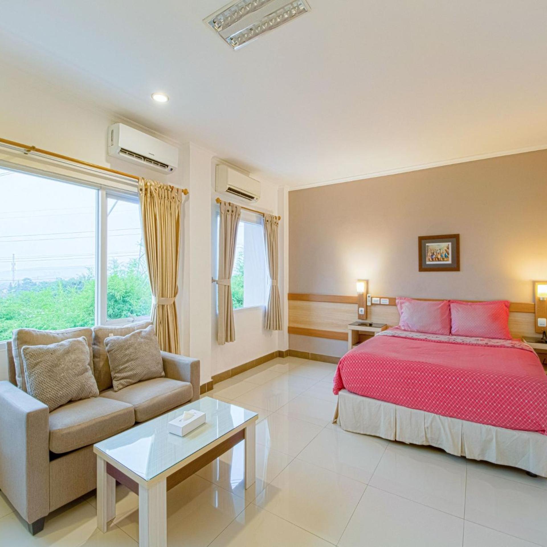 غرفة ديلوكس بسرير مزدوج، Citrus House Com Bogor 3/9
