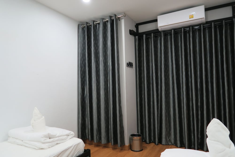 غرفة اقتصادية بسريرين منفصلين بحمام مشترك، The Mira Hotel Chiang Rai 3/3