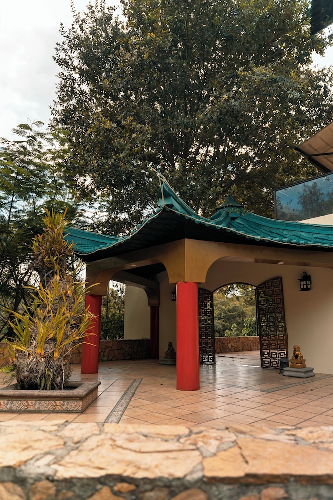 Suites Jardin Imperial 8/63