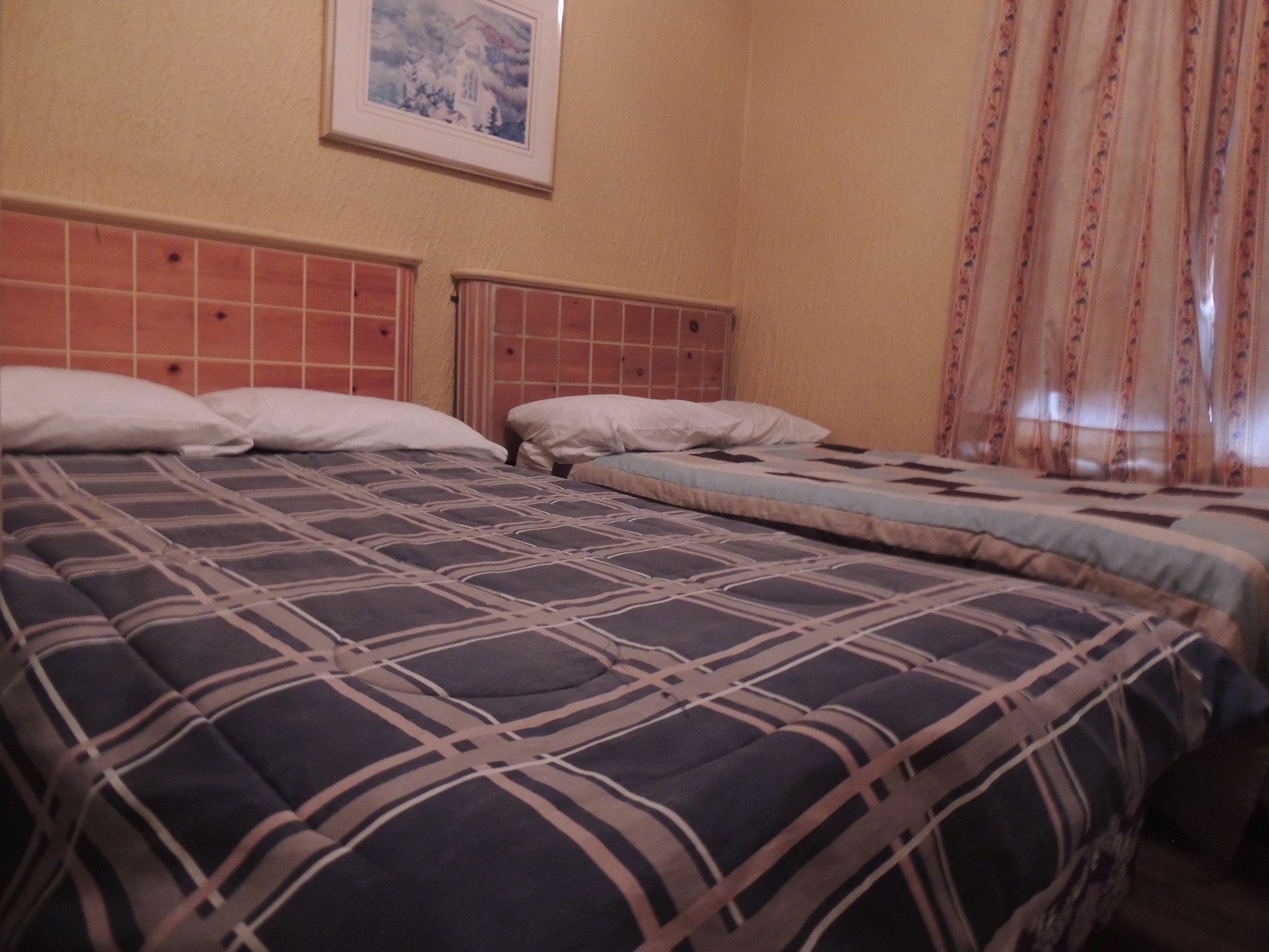 room, 2 double beds, shared bathroom
