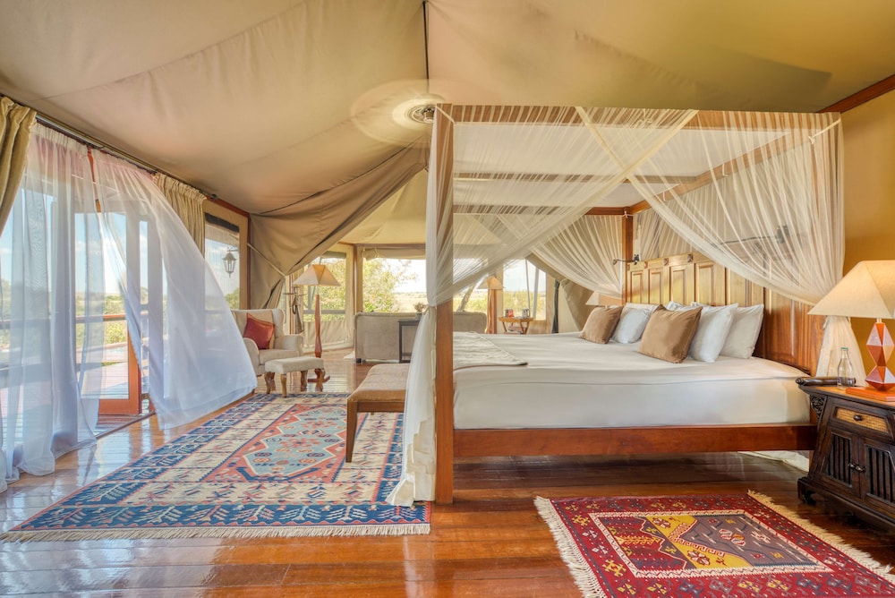 OLARE MARA KEMPINSKI MASAI MARA 16/50