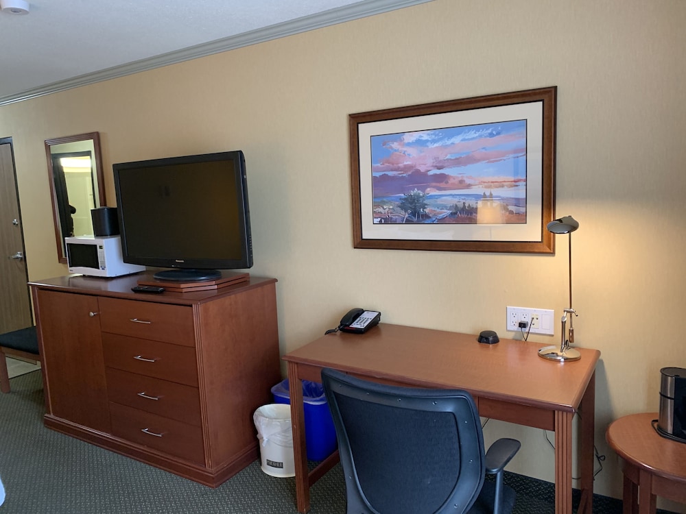 Merit Hotel And Suites 56/66